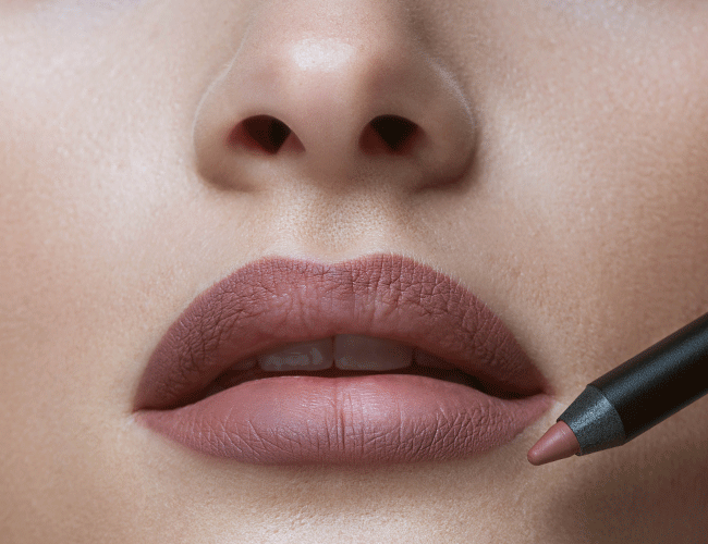 A lip liner and matching gloss make the lips appear larger